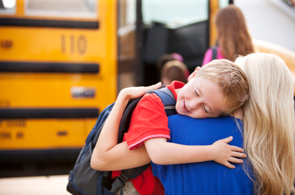 iStock_000020507151XSmall_-_Young_child_hugging_mom_before_bus.jpg